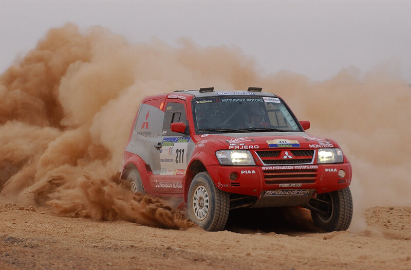 Red Rally Car — Dynamic, Photograph, Dust Cloud