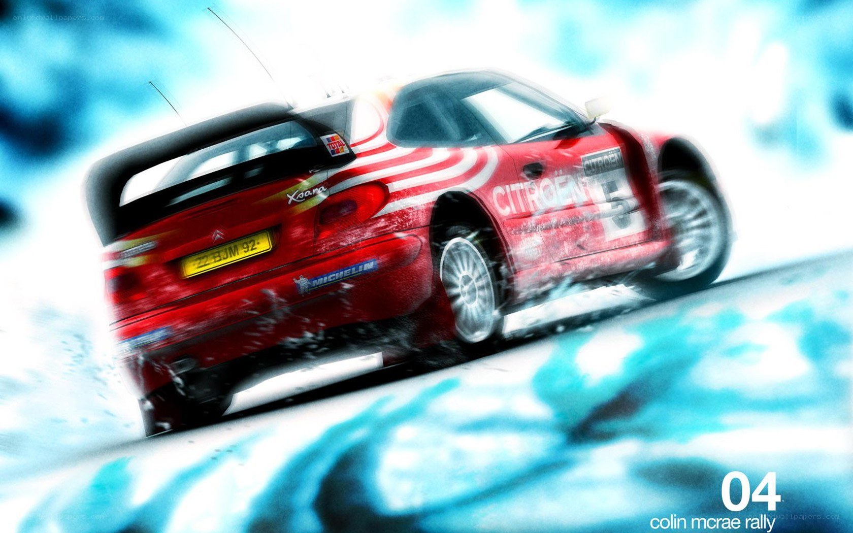 Red rally car in motion