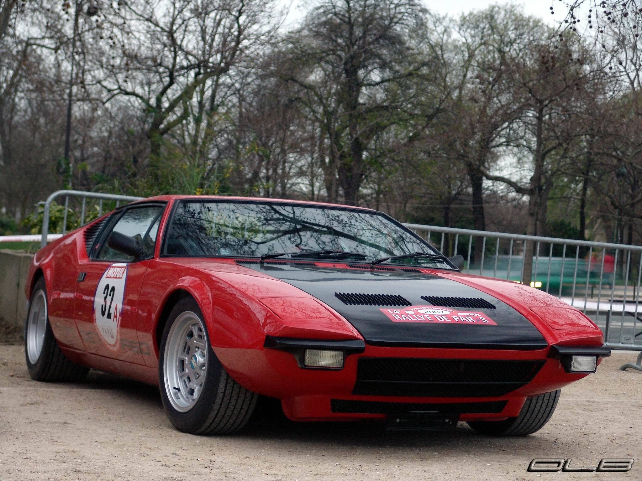 Red rally car in park