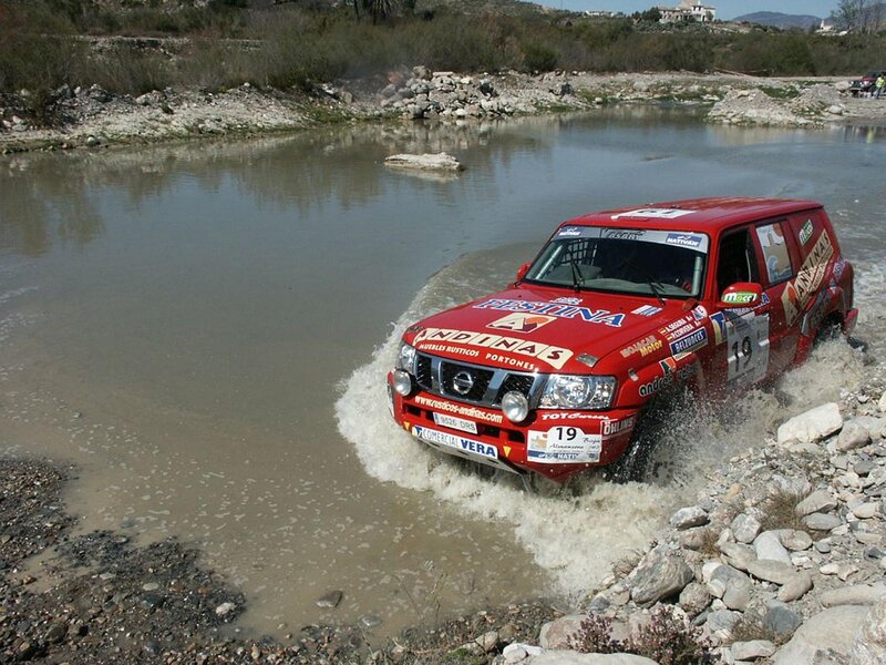 Red Rally Car in Water