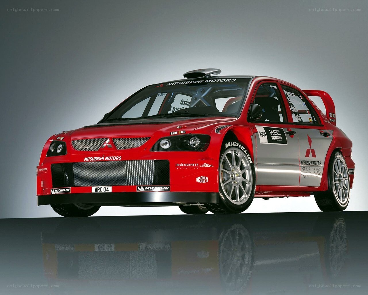 Red rally car on display