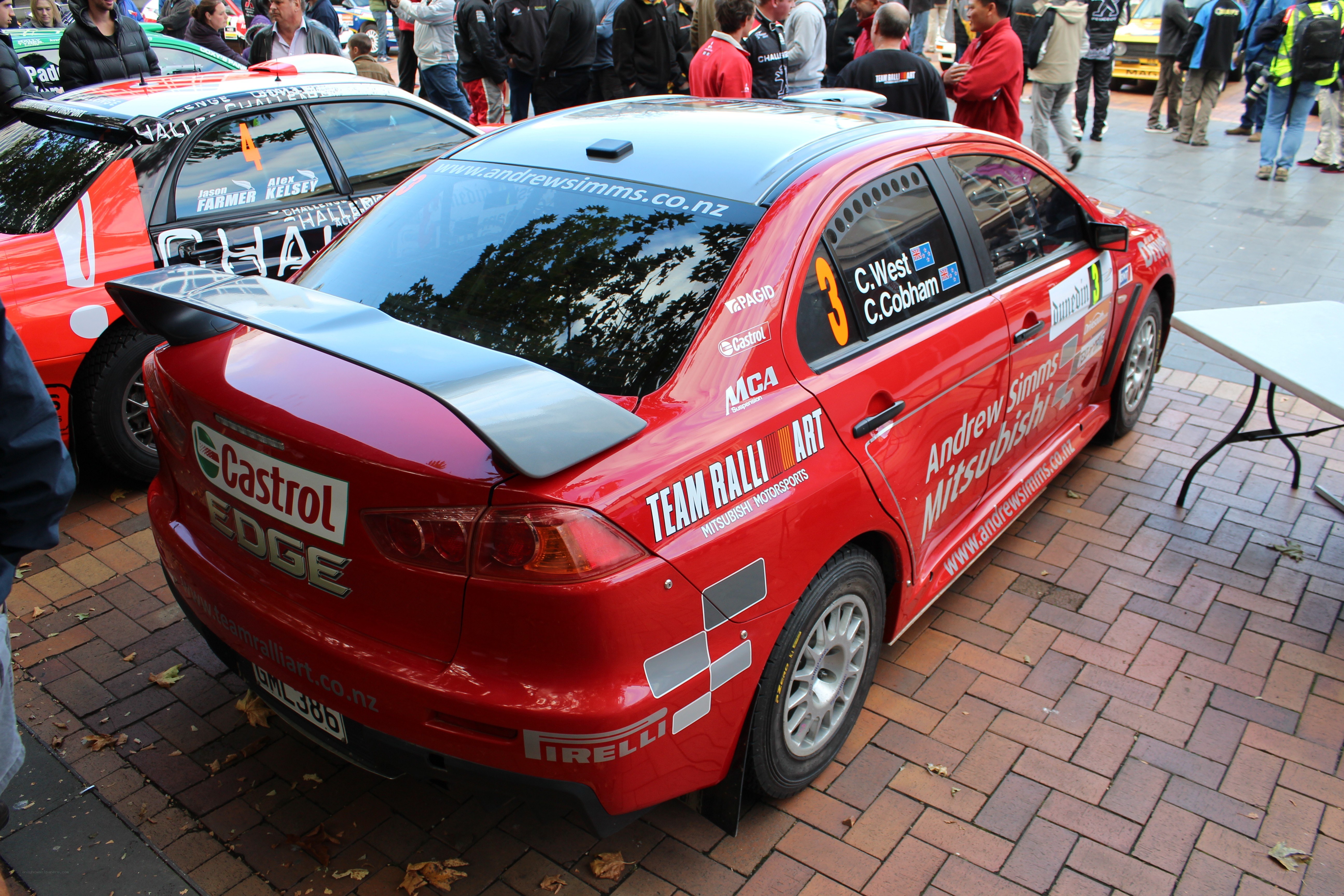 Red rally car on display