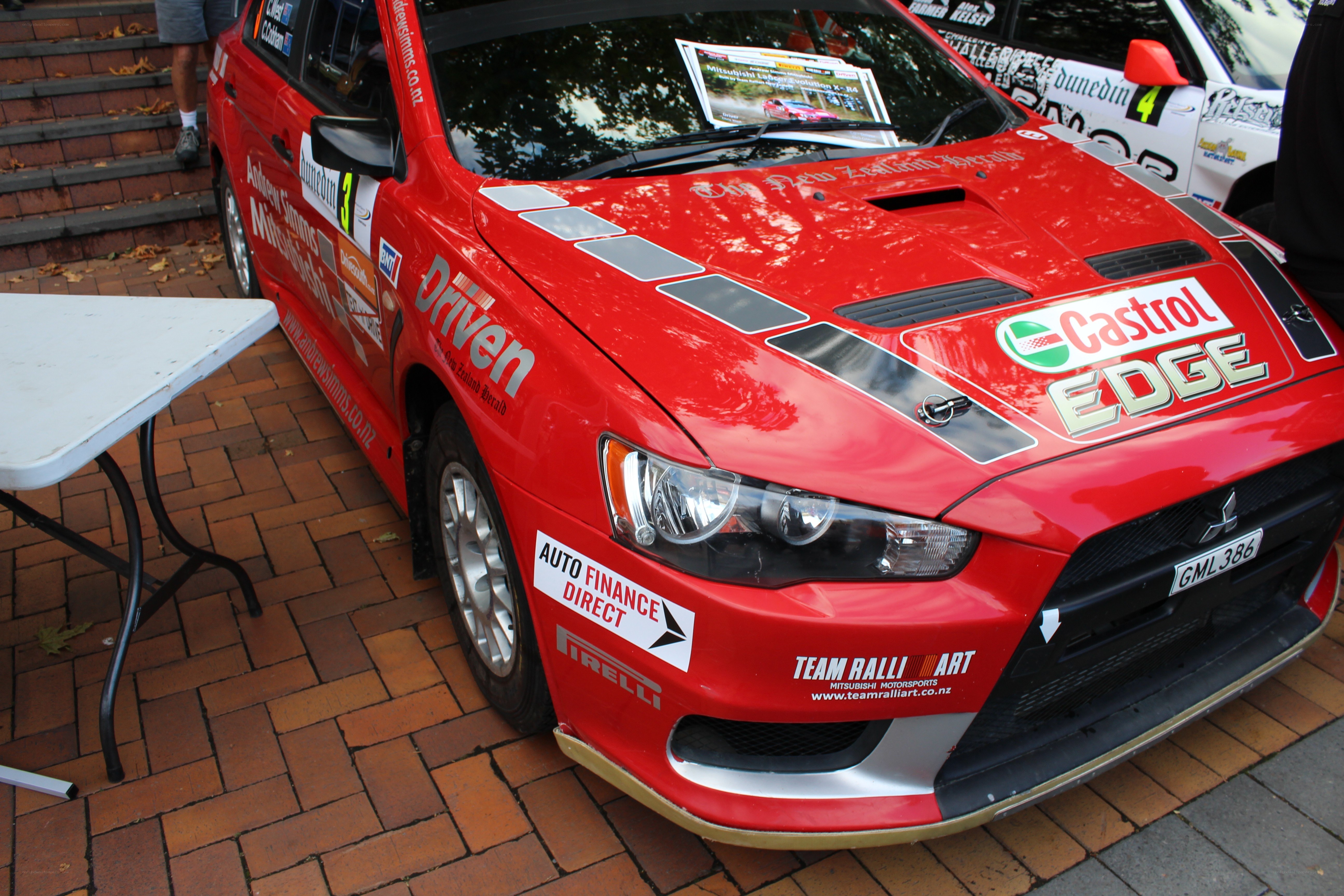 Red rally car on display