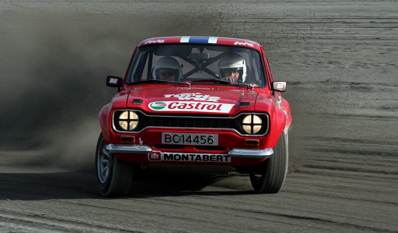 Red rally car on track