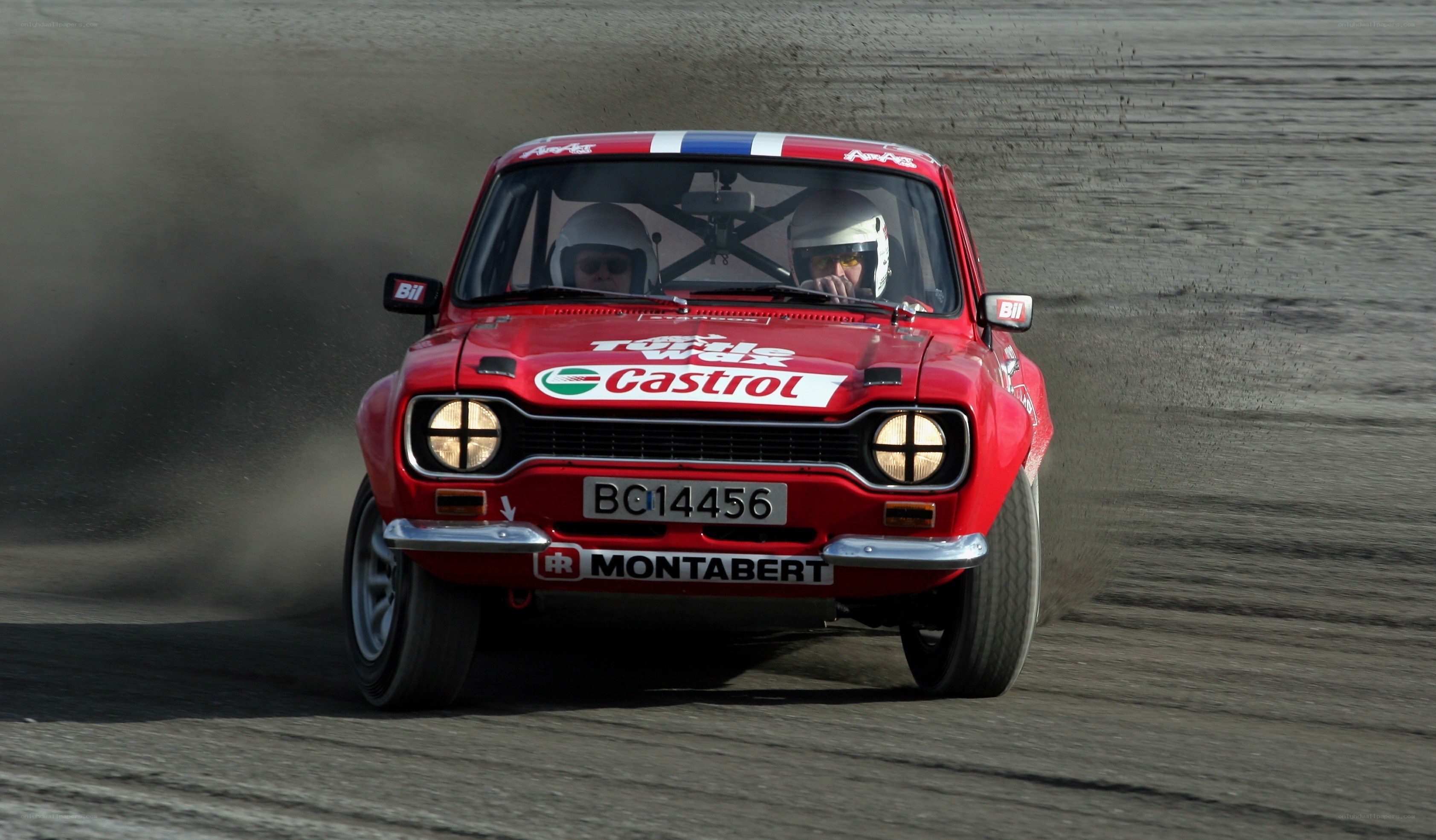 Red rally car on track