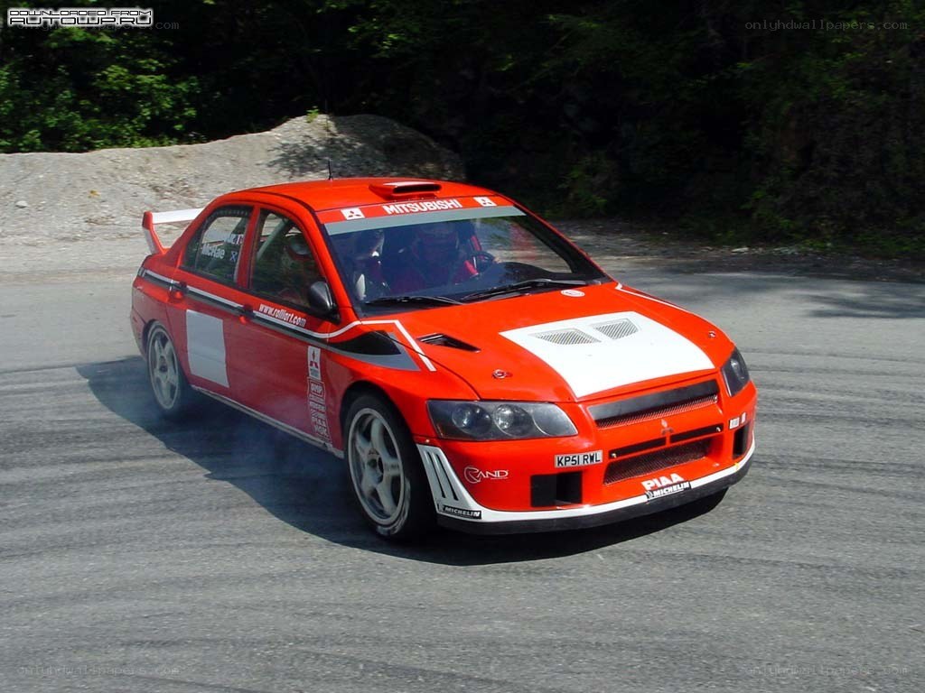 red rally car on track