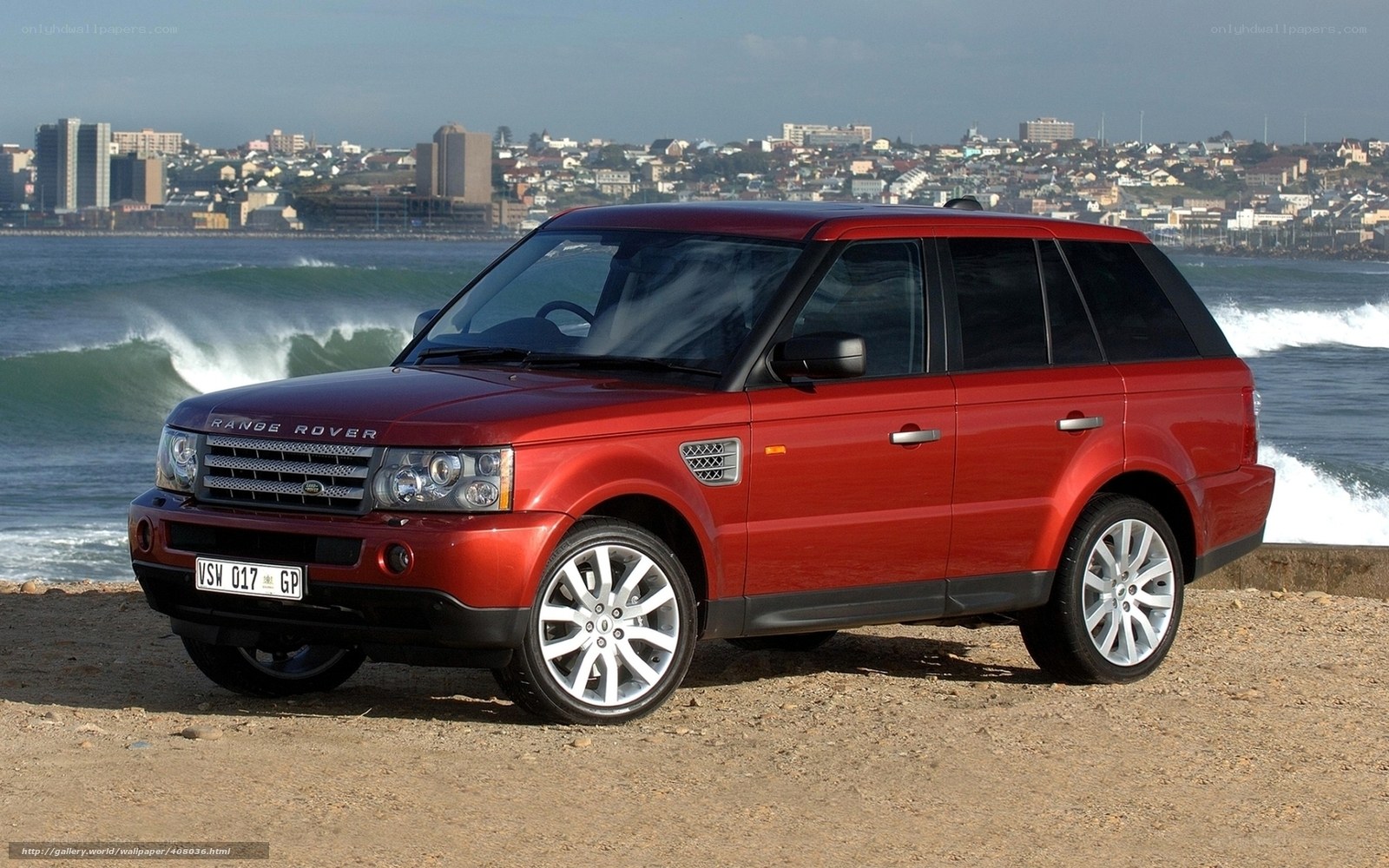 Red Range Rover by the sea
