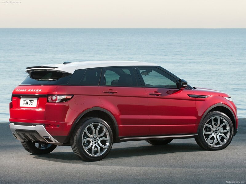 Red Range Rover Evoque by the sea