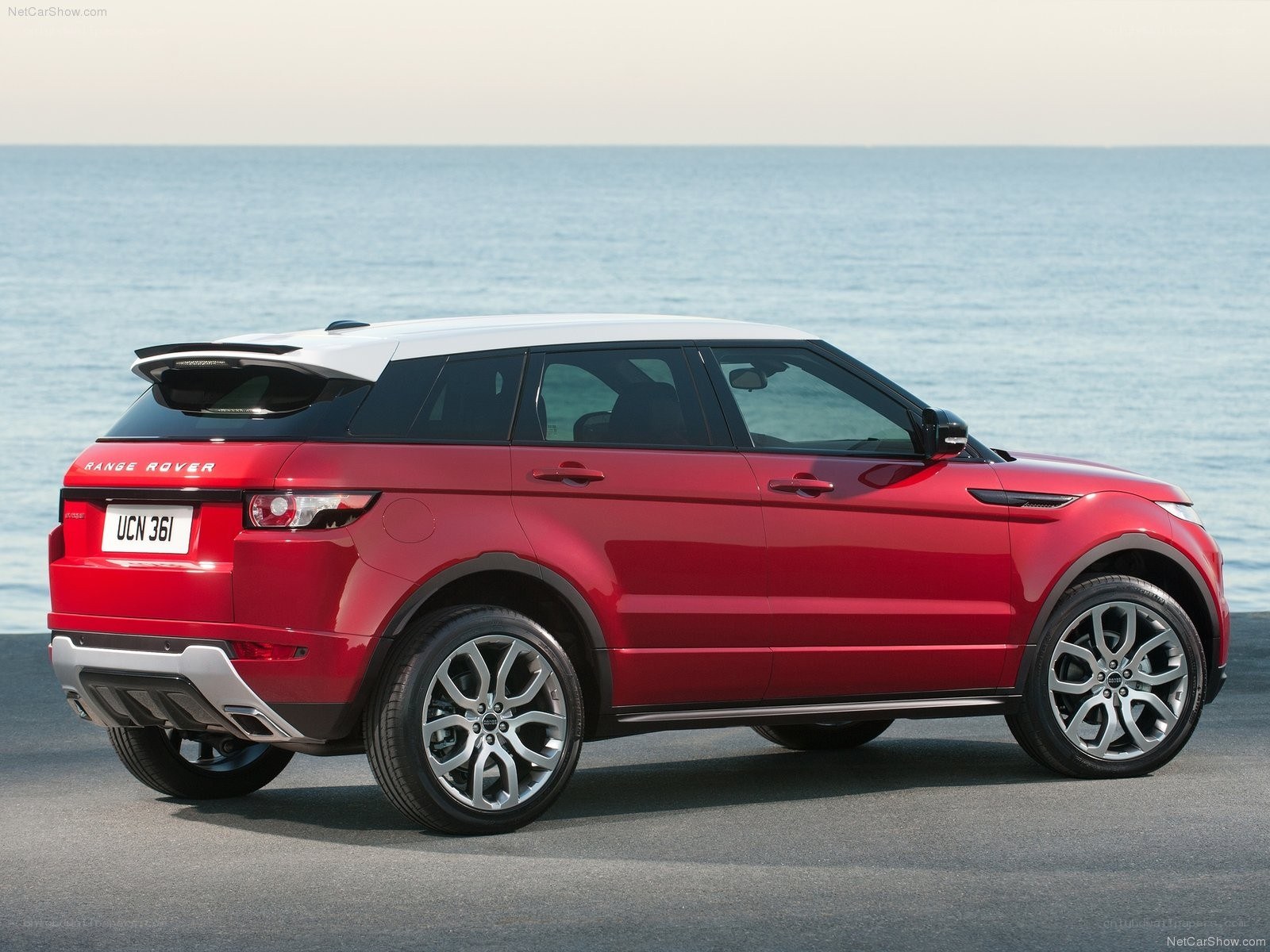 Red Range Rover Evoque by the sea