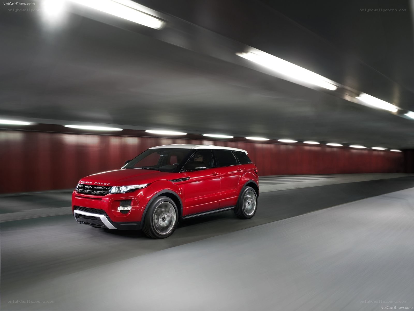 Red Range Rover Evoque in tunnel