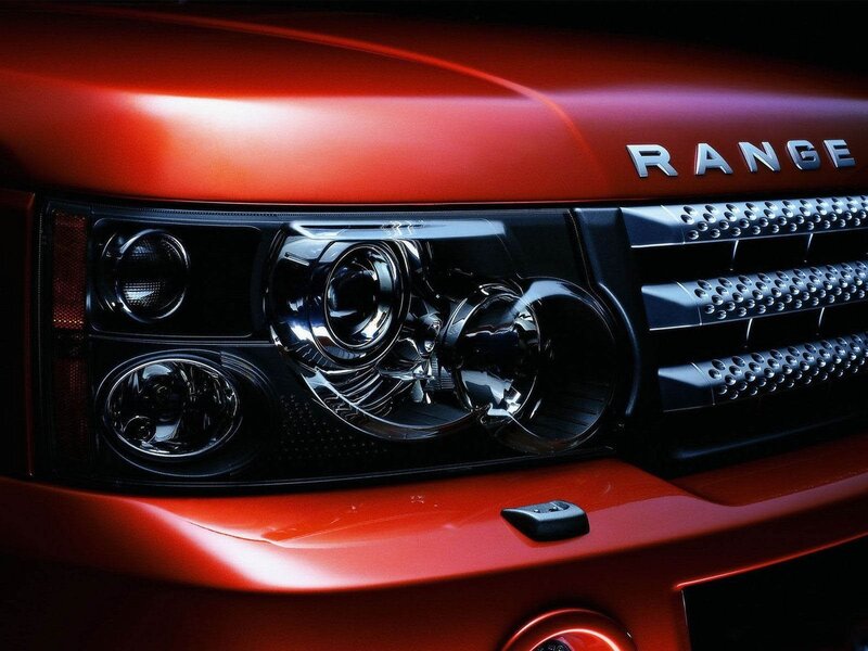 Red Range Rover Headlight — Dramatic