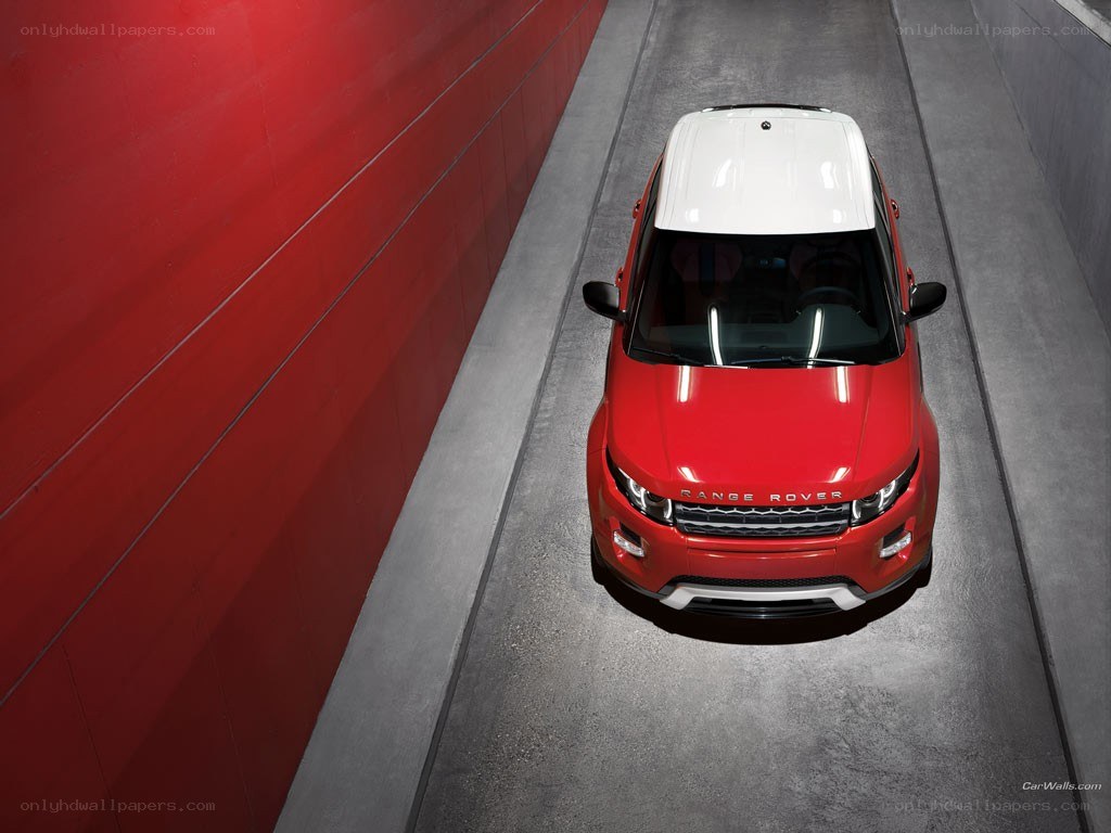 Red Range Rover in tunnel