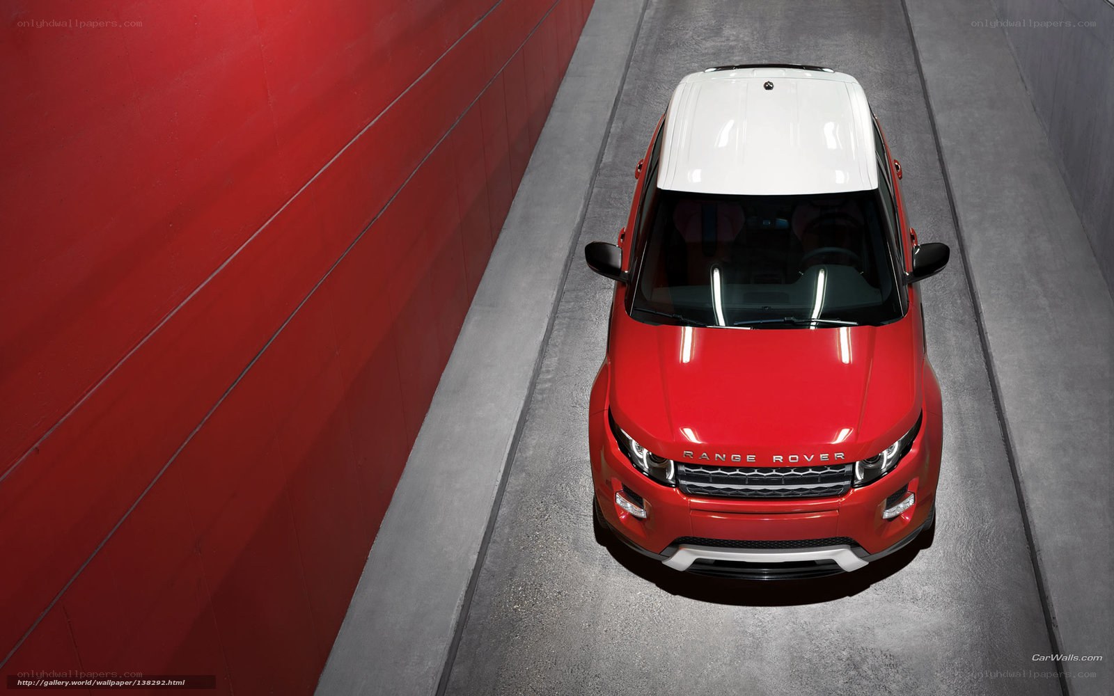 Red Range Rover in tunnel