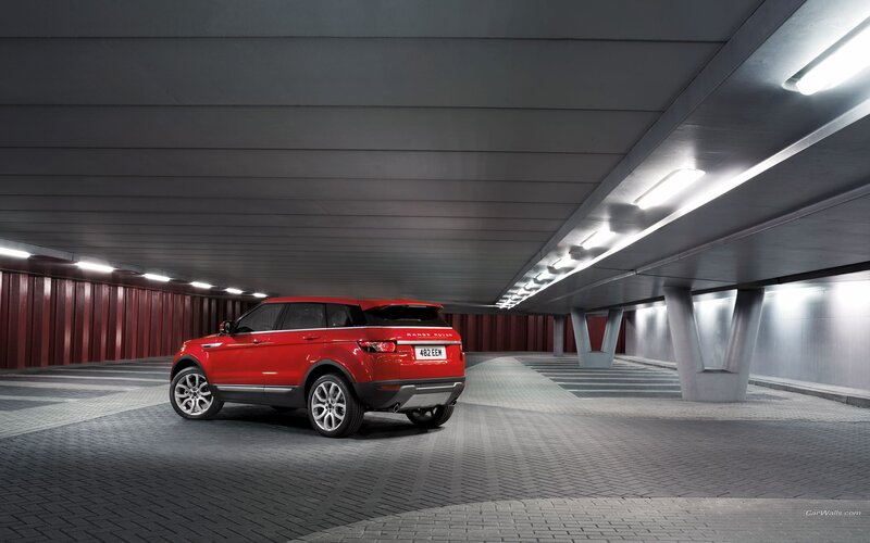 Red Range Rover in underground garage