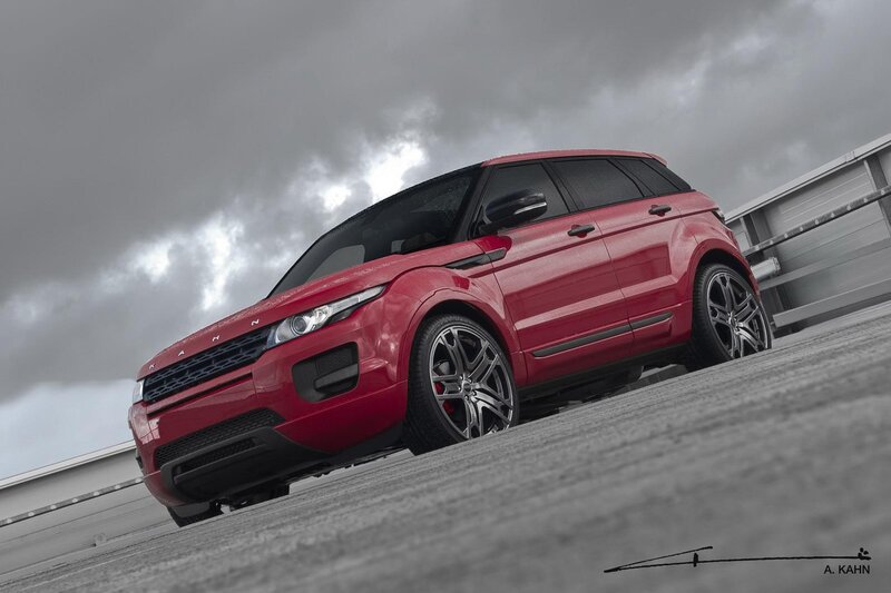 Red Range Rover on a ramp