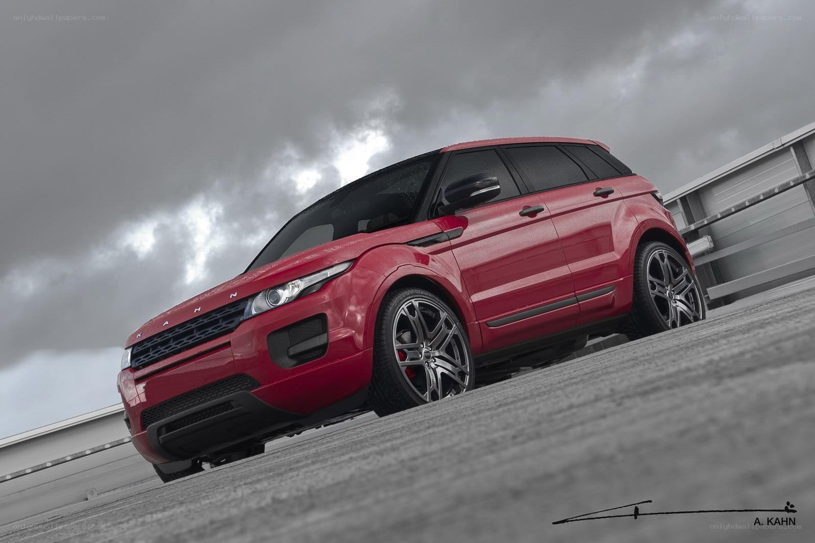 Red Range Rover on a ramp