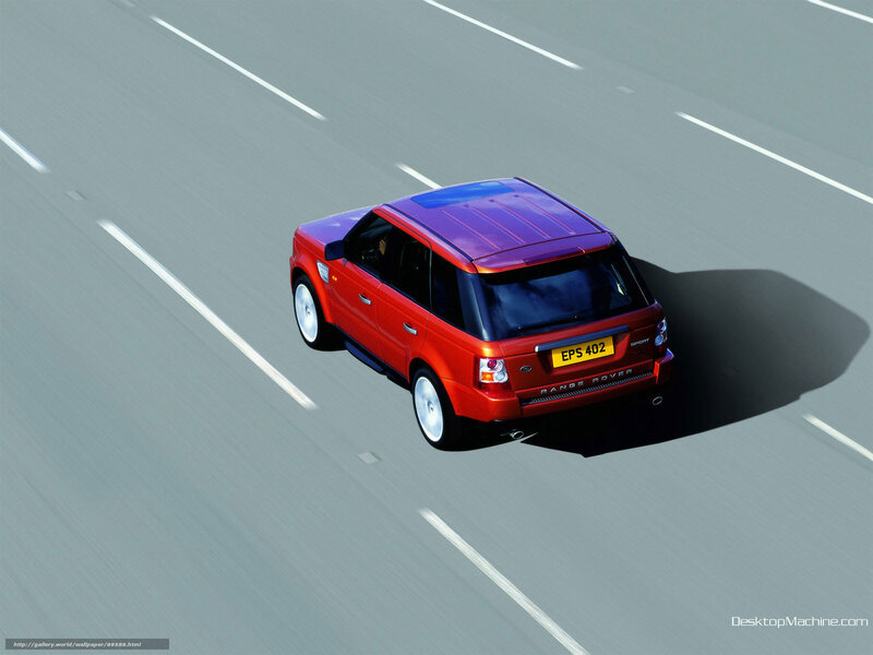 red range rover on highway
