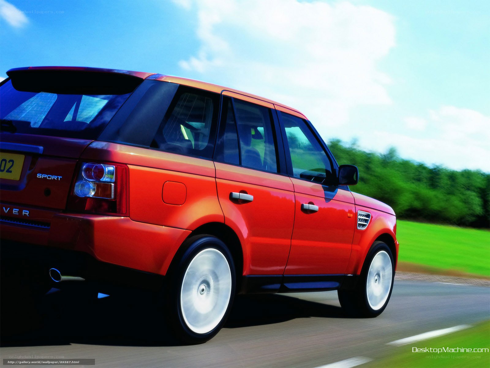 Red Range Rover Sport in motion