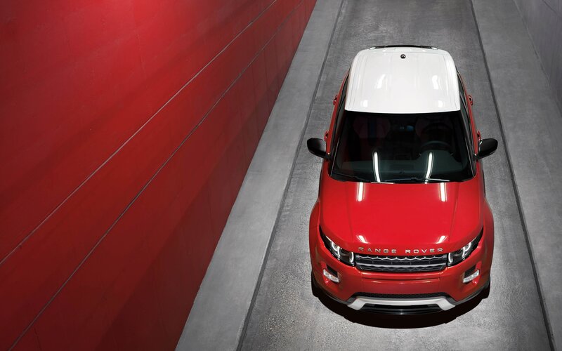 Red Range Rover Suv — Dramatic, Photograph
