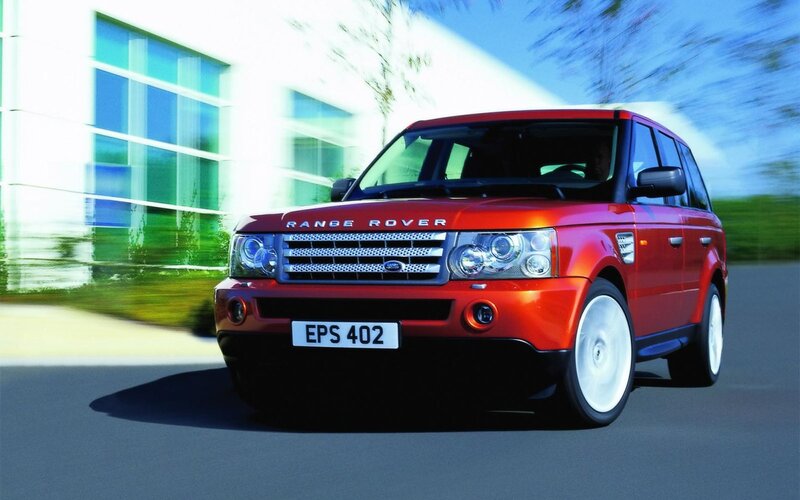 Red Range Rover Suv — Dynamic, Afternoon, Photograph, Building, Road, Trees