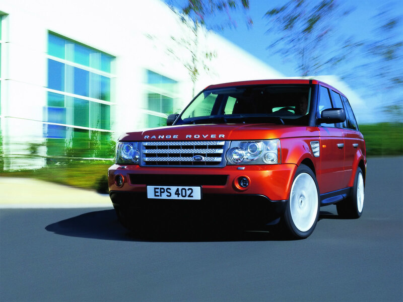 Red Range Rover Suv — Dynamic, Afternoon, Photograph, Building, Trees