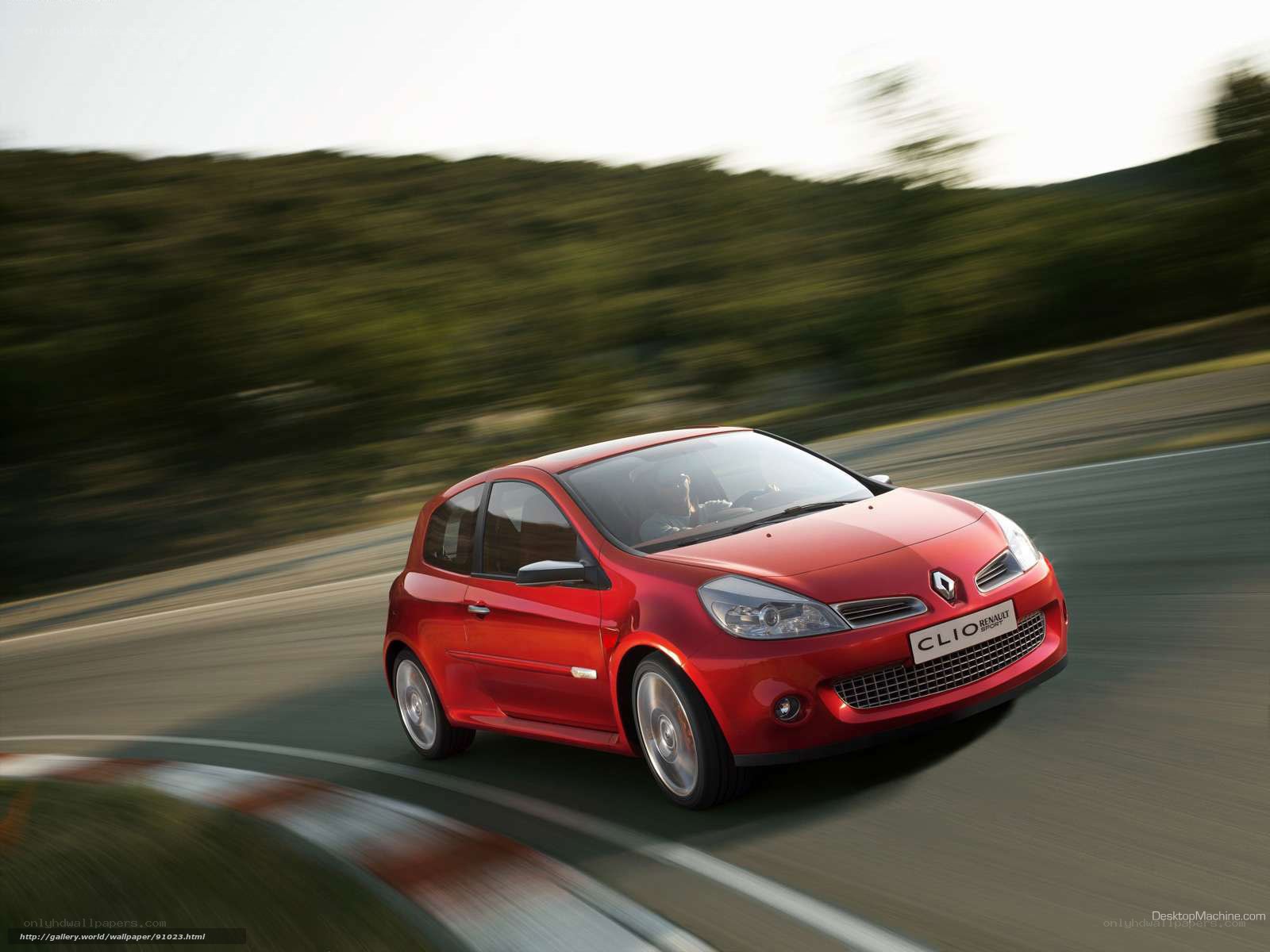 Red Renault Clio in motion