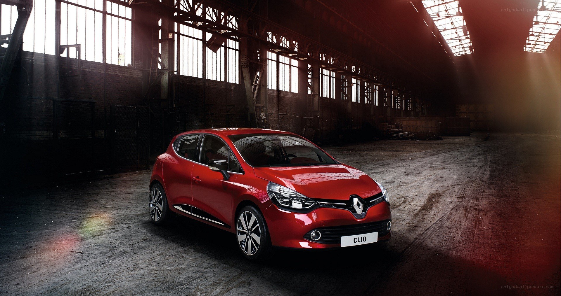 Red Renault Clio in warehouse