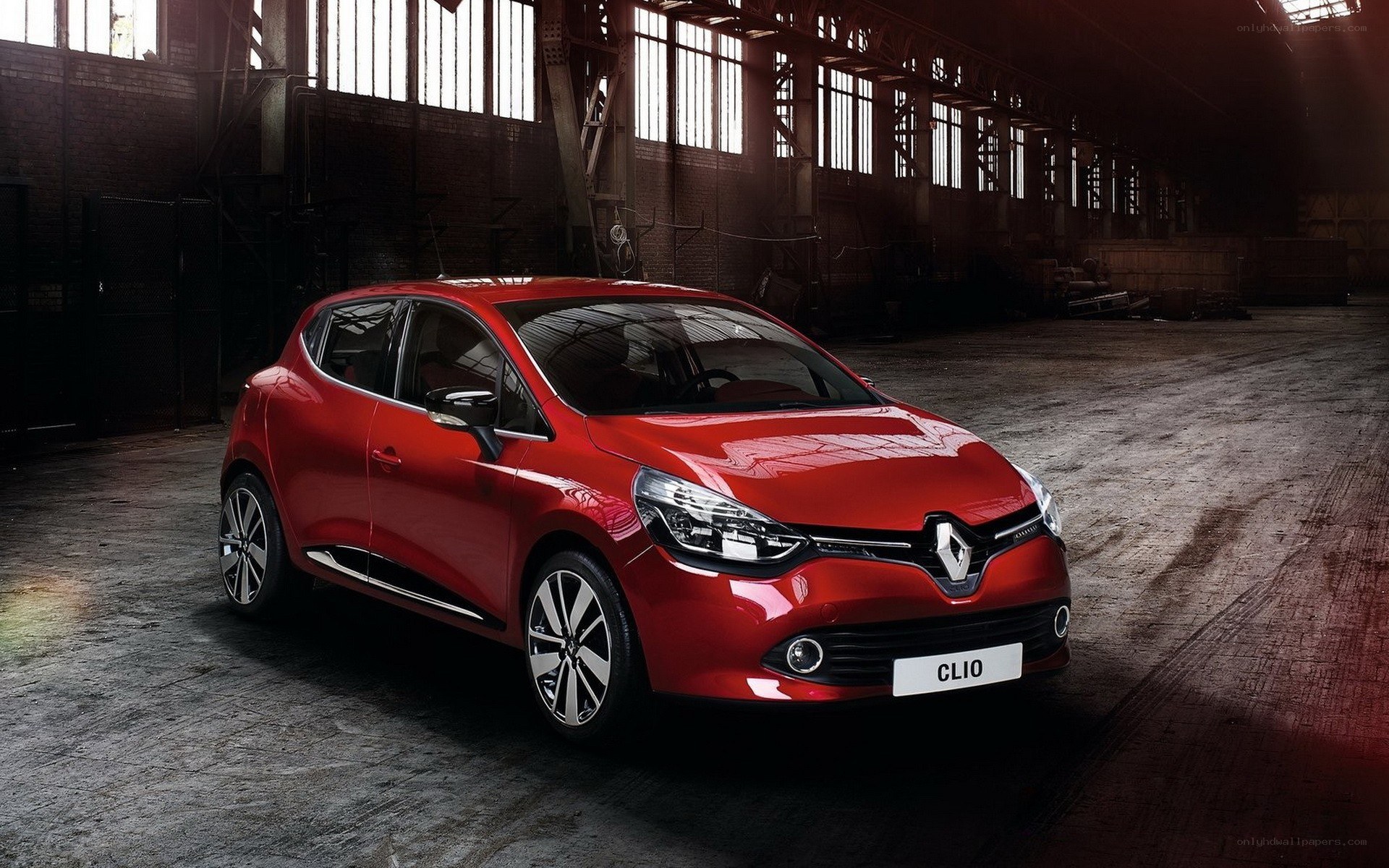 Red Renault Clio in warehouse