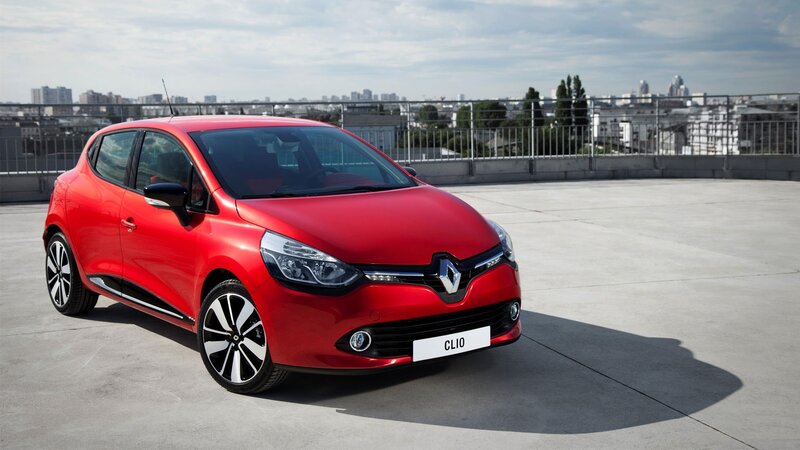 Red Renault Clio on rooftop