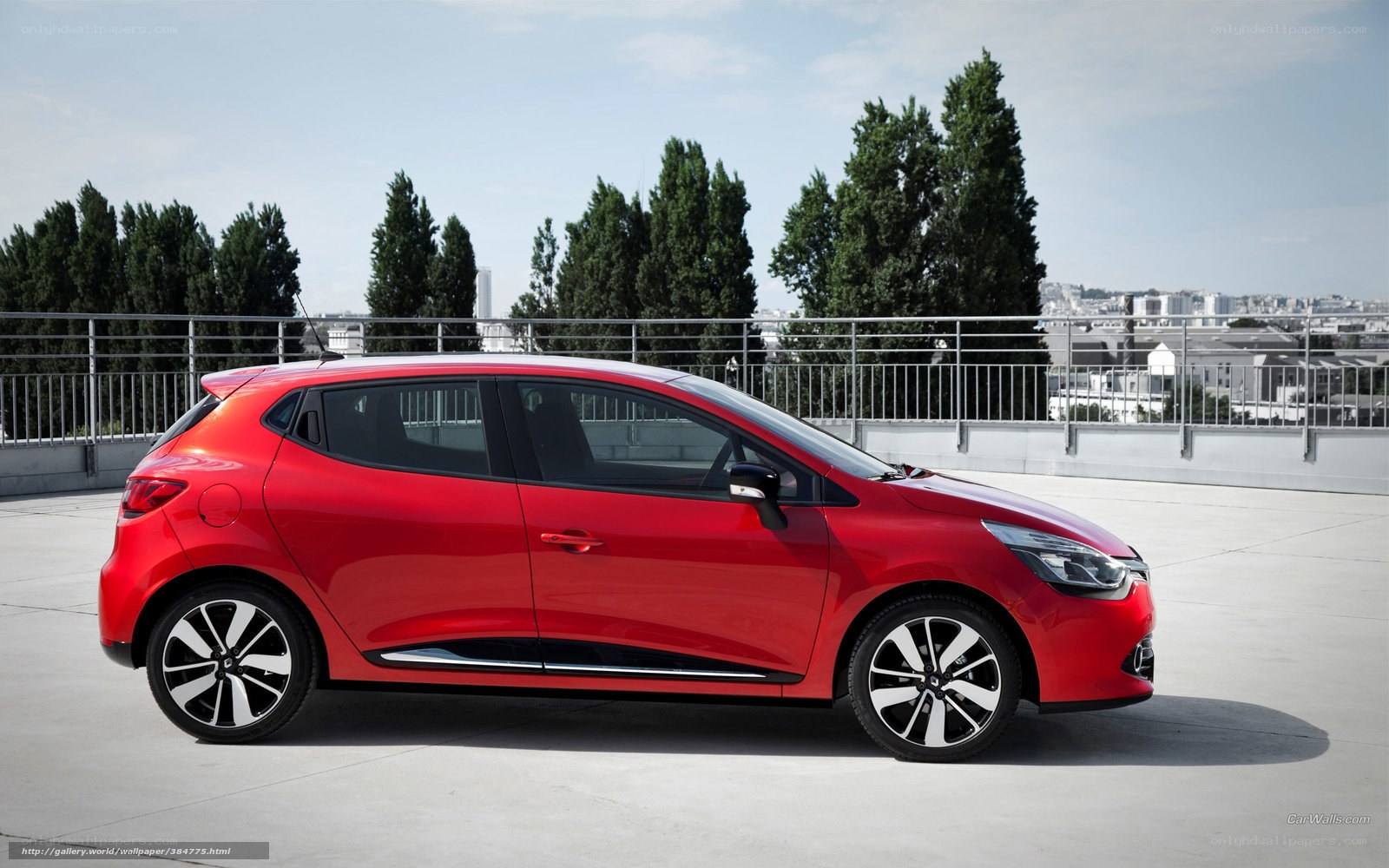 Red Renault Clio parked on rooftop