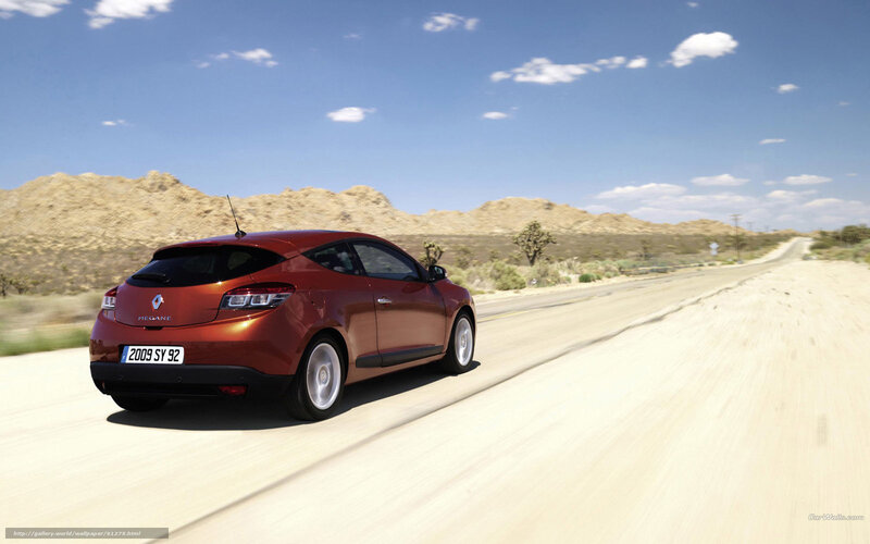 Red Renault Megane driving on desert road
