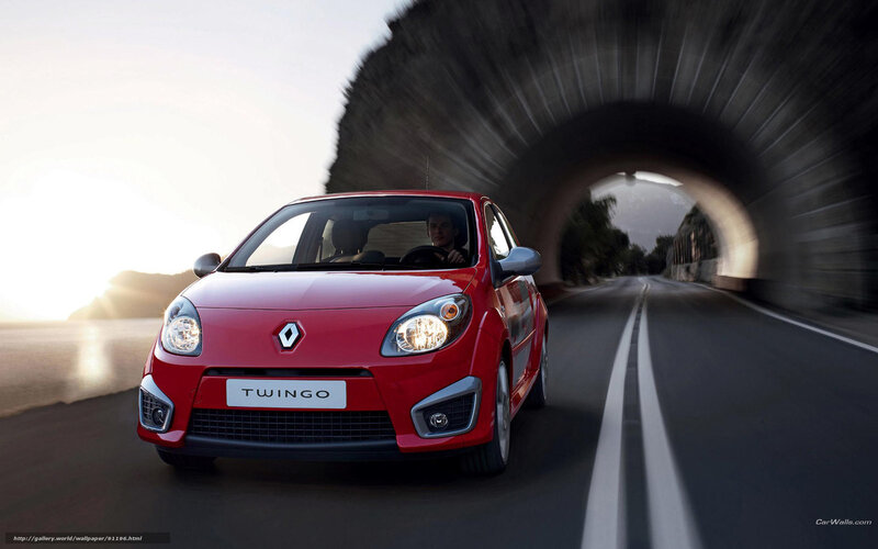 Red Renault Twingo driving through tunnel