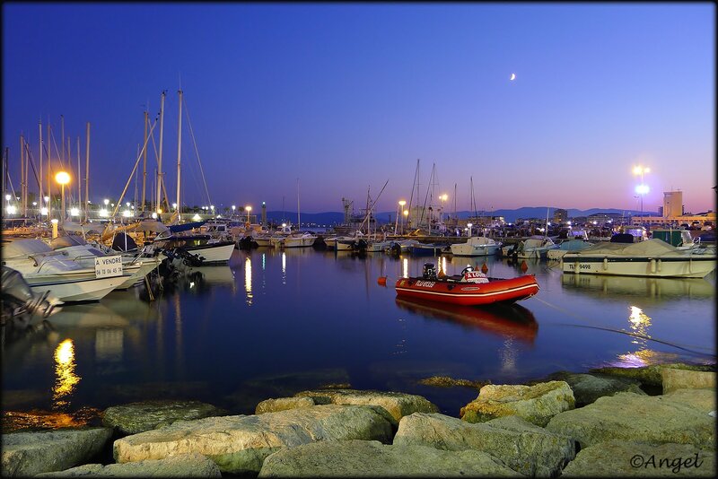 Red Rescue Boat in Harbor