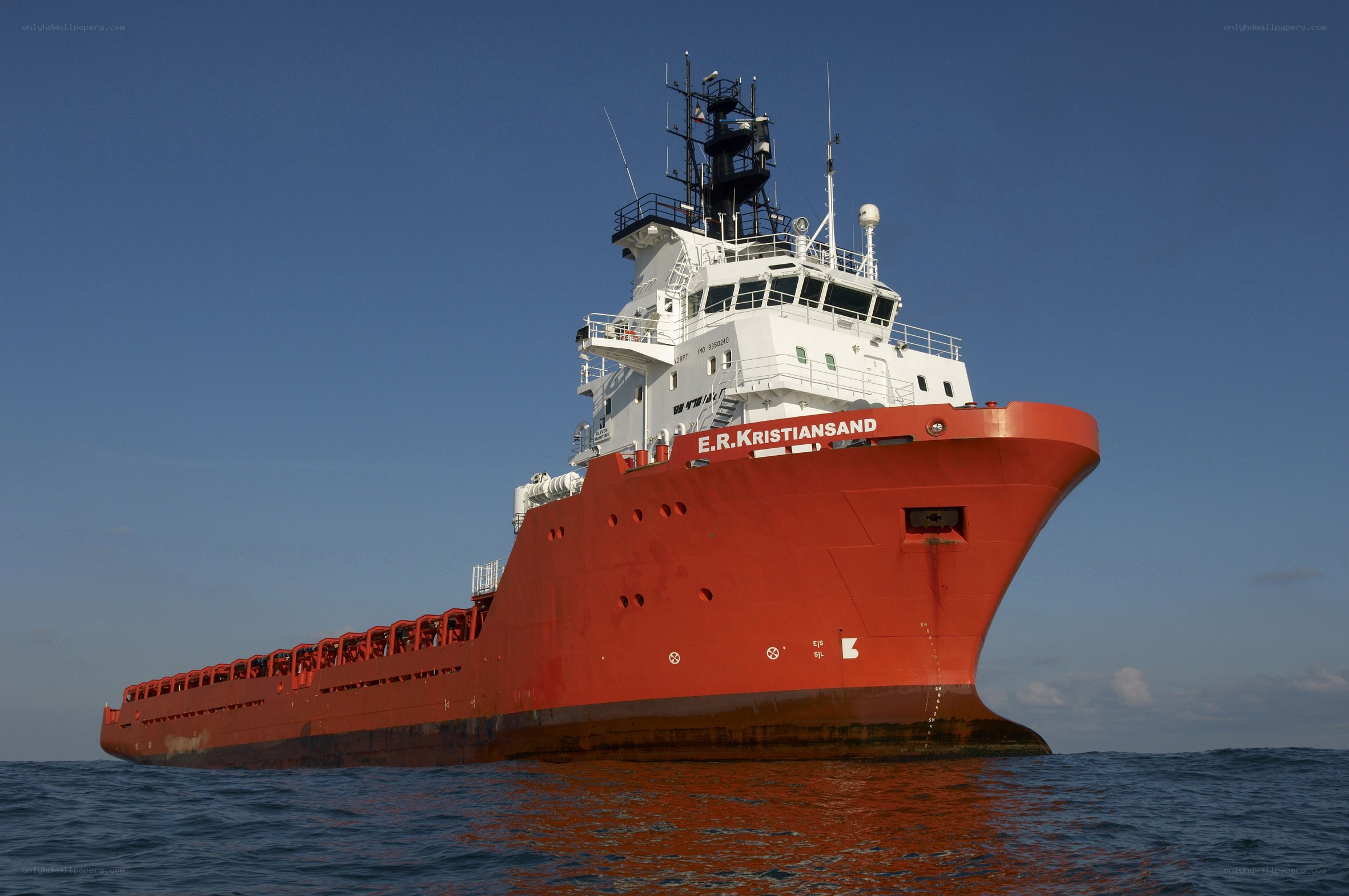 Red research vessel at sea