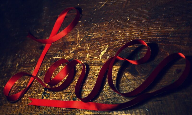 Red Ribbon Forming Word