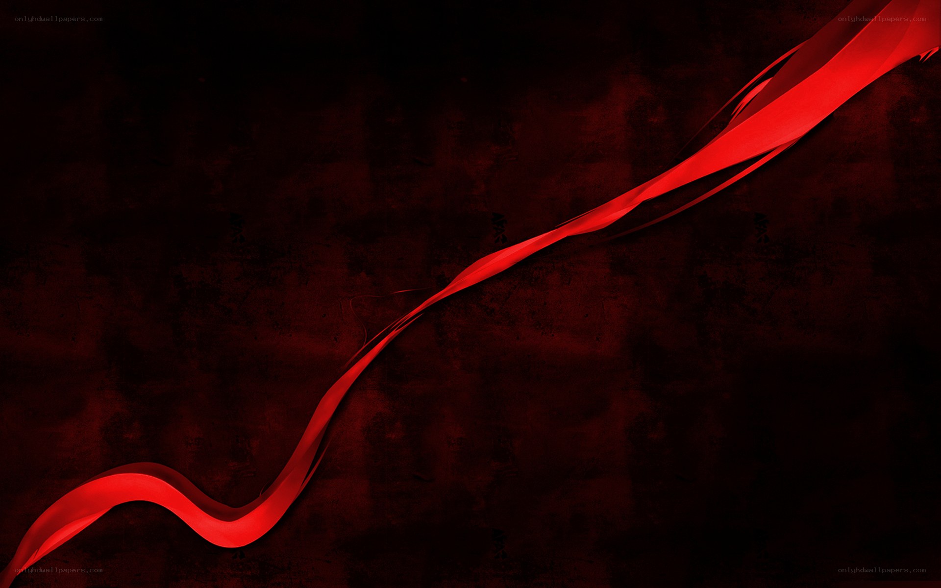 Red ribbon on dark background
