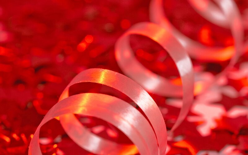 red ribbon on festive background