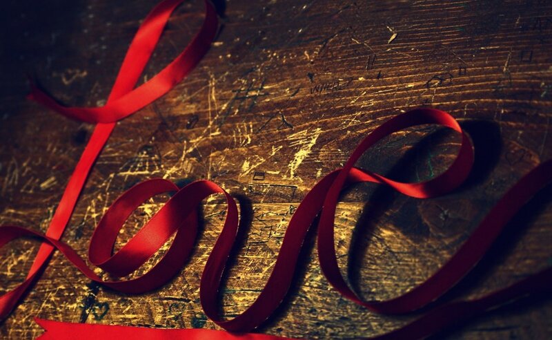 Red Ribbon on Wood — Dramatic, Photograph