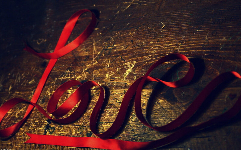 Red Ribbon on Wood — Dramatic, Photograph, Wood Surface