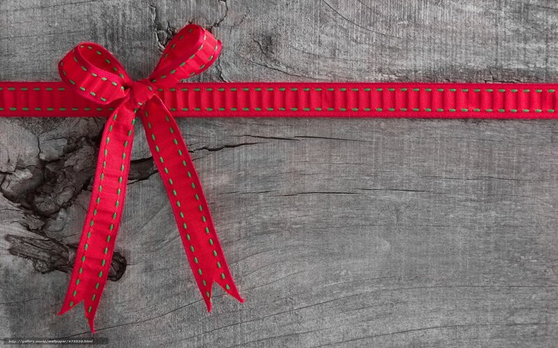 red ribbon on wood