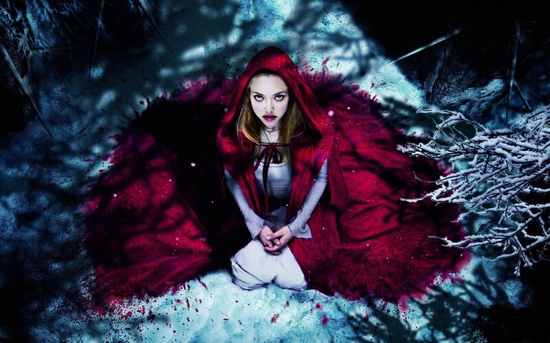 Red Riding Hood in snowy forest