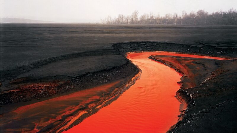 Red River in Black Field — Dramatic