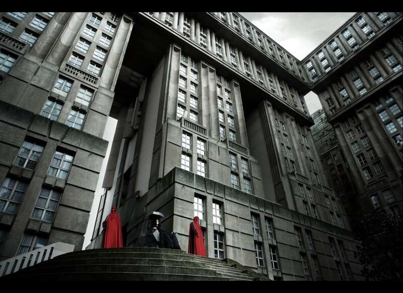 Red-robed figures on steps