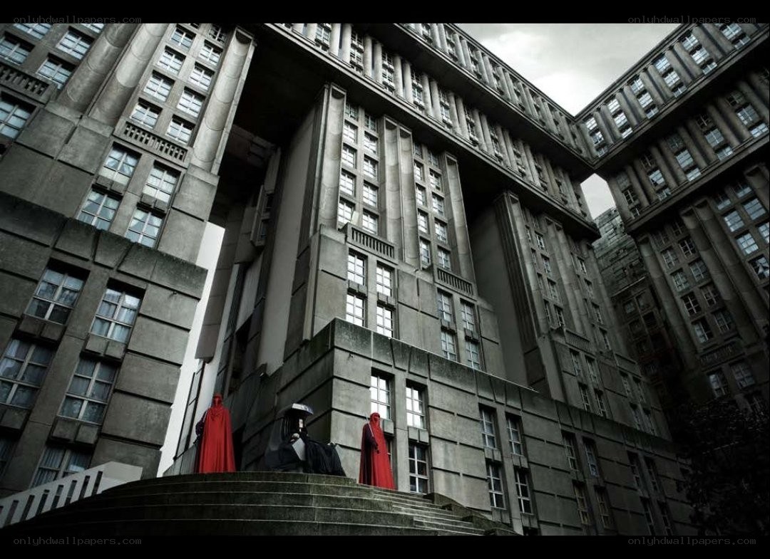Red-robed figures on steps