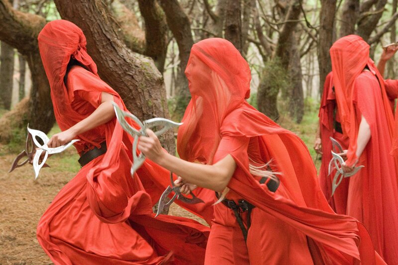 Red-robed warriors in forest