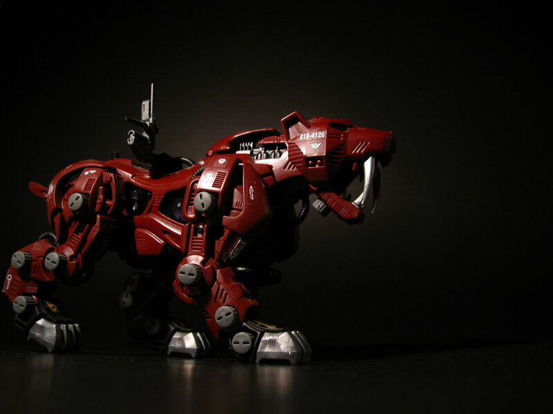 Red robotic lion figure