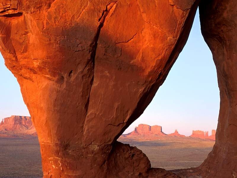 Red rock arch at sunset