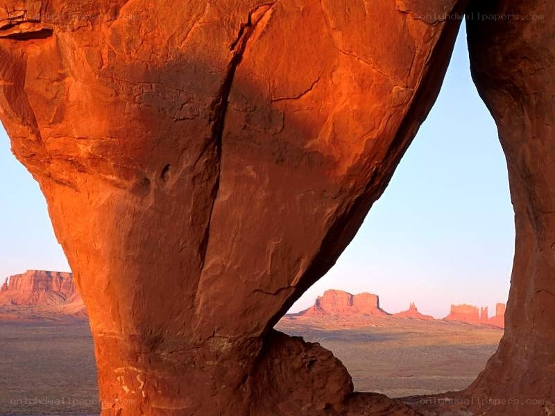 Red rock arch at sunset