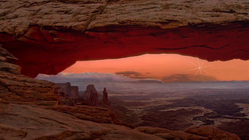 Red rock arch at sunset