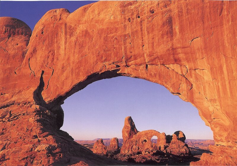 Red Rock Arch Formation — Orange, Dramatic, Sunset, Photograph, Rock Formations, Sky, Blue